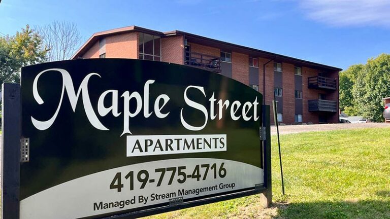 Maple Street Apartments - exterior and property sign